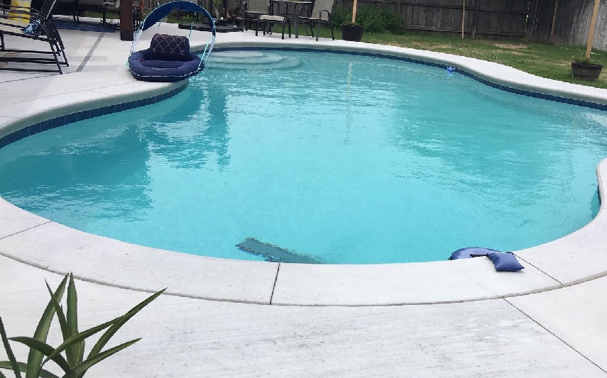 Freeform pool ideal around existing features and landscaping